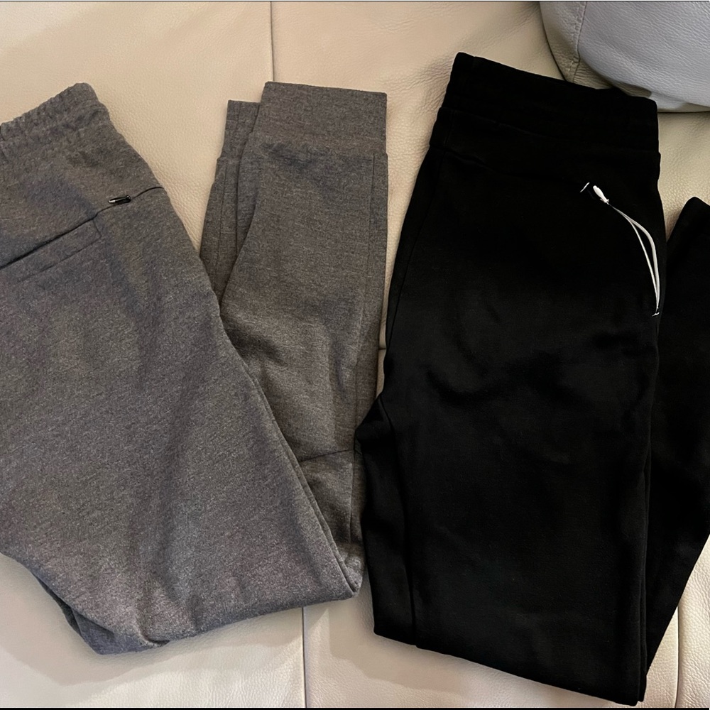 Mens Zara jogger pants. The black joggers have a zipper on bottom side leg.